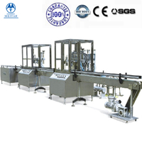 China Manufactory QGQ 750 High Quality Full Automatic sunscreen spray aerosol filling machine line